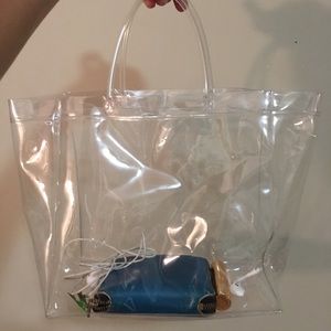 Clear Vinyl Tote. Approx 13” long x 9” tall. New.